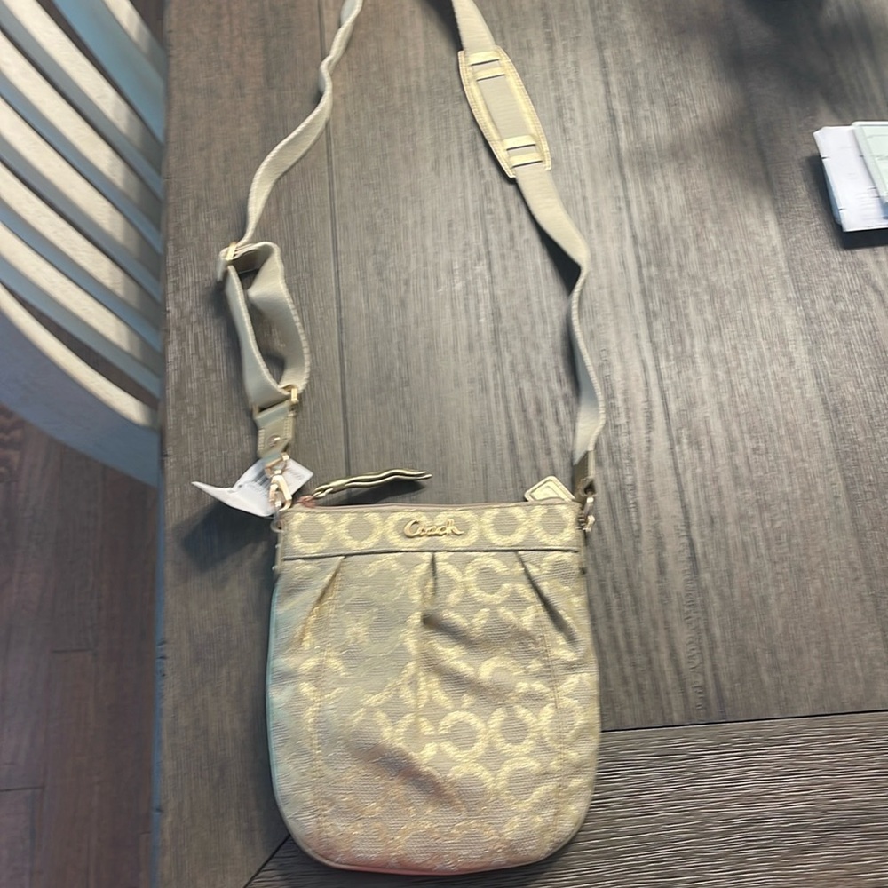 Coach crossbody- gold